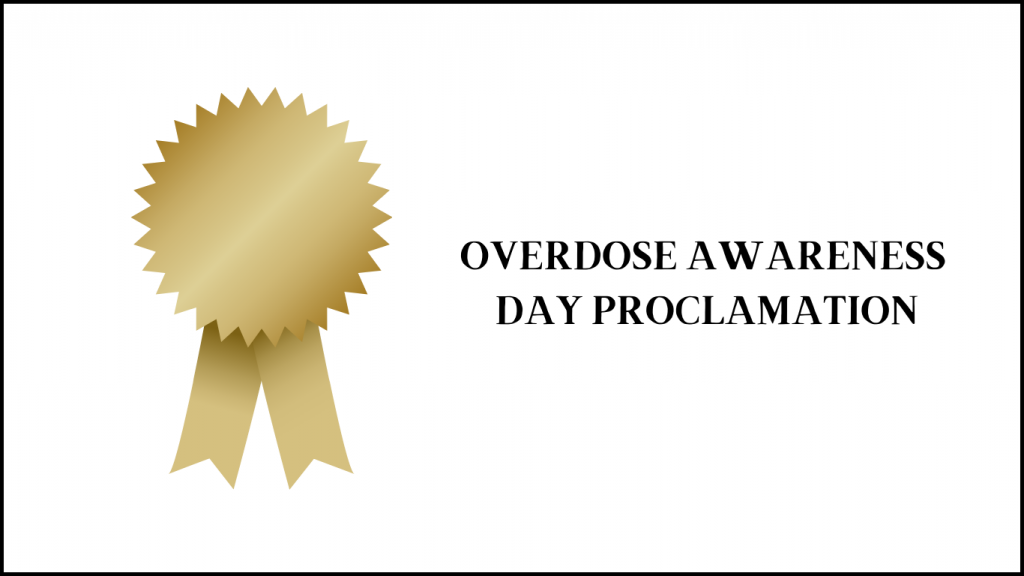 gold ribbon with text reading: overdose awareness day proclamation